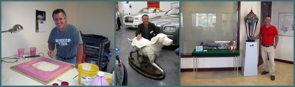 An artist smiling while working on a colorful art piece in a studio.